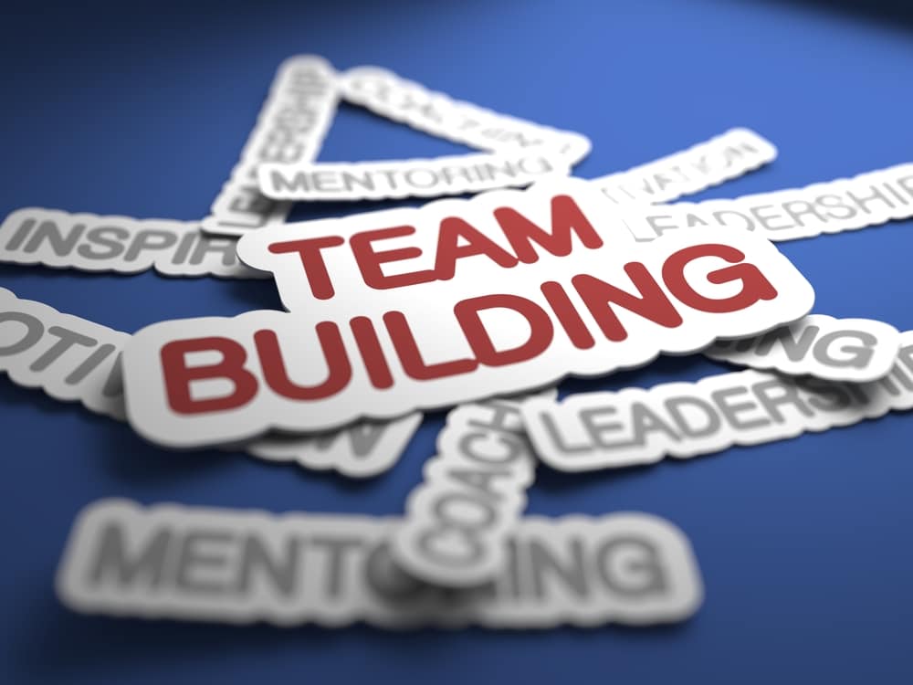 Team Building Text on Blue Background with Selective Focus. 3D Render