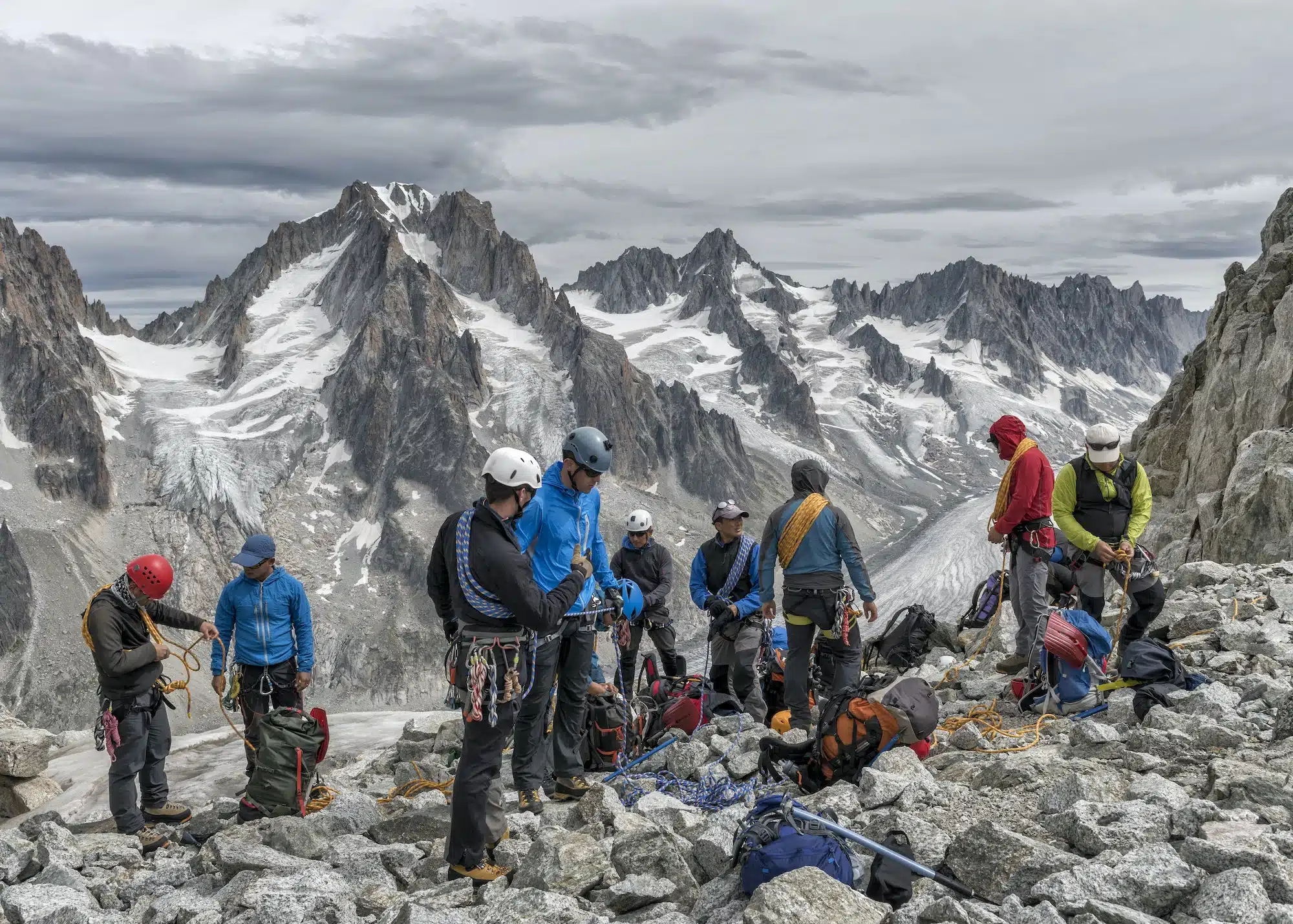 France, Chamonix, Grands Montets, Aiguille d' Argentiere, group of mountaineers preparing